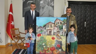 Ermenek Belediye Başkanı Mustafa Bozcu, Ressam Öğretmen Mehmet Satırlı’yı makamında
